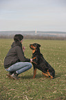 woman and Rottweiler