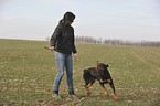 woman and Rottweiler