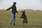 woman and Rottweiler