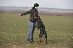 woman and Rottweiler