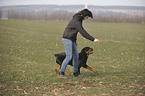 woman and Rottweiler