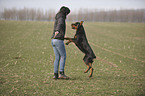 woman and Rottweiler