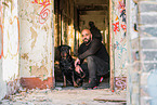 man and Rottweiler