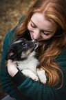 woman and Sheltie puppy