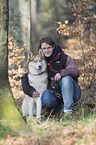 woman and Siberian Husky