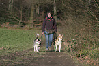 woman and 2 Siberian Husky