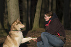 woman and Siberian Husky