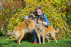 woman and 2 Tervueren