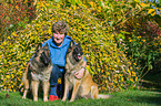 woman and 2 Tervueren