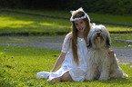 girl with Tibetan Terrier