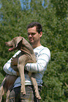 man with Weimaraner