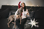 woman and Weimaraner