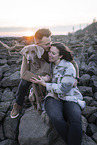 human with Weimaraner