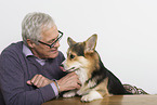 man and Welsh Corgi Pembroke