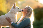 woman with white shepherd