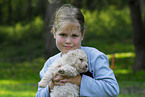 girl with puppy