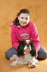 girl with King Charles Spaniel