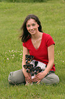 woman with Jack Russell Terrier puppies