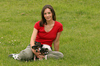woman with Jack Russell Terrier puppies