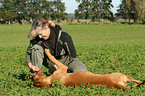 woman with Rhodesian Ridgeback