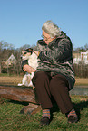 Senior fondling dog
