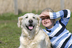 girl with golden retriever