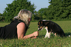 woman with mongrel puppy