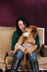 woman and young mongrel