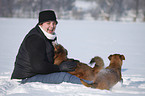 woman with mongrels