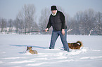 woman with mongrels