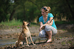 woman with mongrel