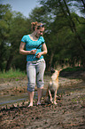 woman with mongrel