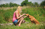 woman with mongrel