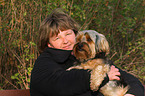 woman and Yorkshire-Terrier-Mongrel