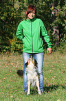 woman and Shetland-Sheepdog-Mongrel