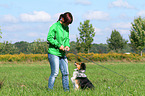 woman and Shetland-Sheepdog-Mongrel