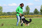 woman and Shetland-Sheepdog-Mongrel