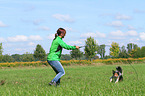 woman and Shetland-Sheepdog-Mongrel