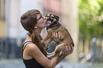 woman with Chihuahua-Pekinese-Mongrel