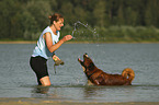 woman with Bernese-Mountain-Dog-Saint-Bernard-Mongrel