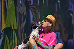 man with Pointer-French-Bulldog-Mongrel