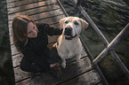 woman and Labrador-Retriever-Mongel