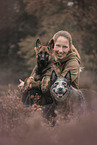 woman and 2 dogs