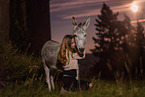 woman and donkey