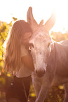 woman and donkey