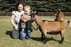 family with goat
