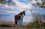 woman and Andalusian Horse