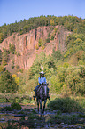 girl rides Appaloosa