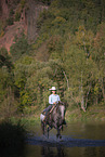 girl rides Appaloosa