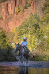 girl rides Appaloosa